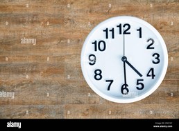 clock-show-4-am-or-pm-and-30-minute-on-wood-background-with-copy-space-H5K1XY